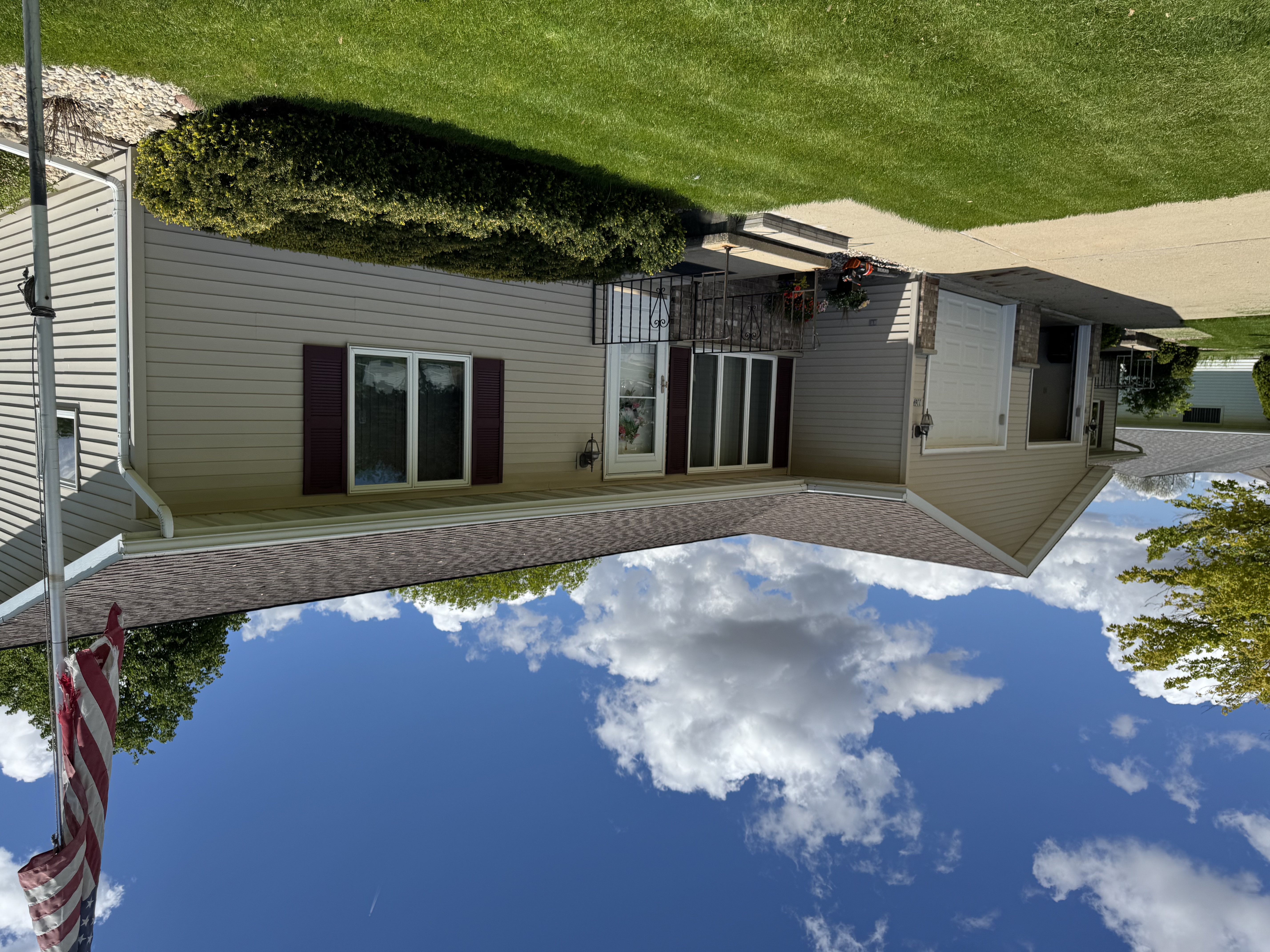 Summit Window Washing technician cleaning windows